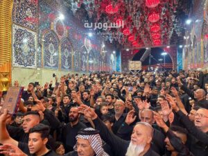 المواكب الحسينية في كربلاء ترفع القرآن الكريم